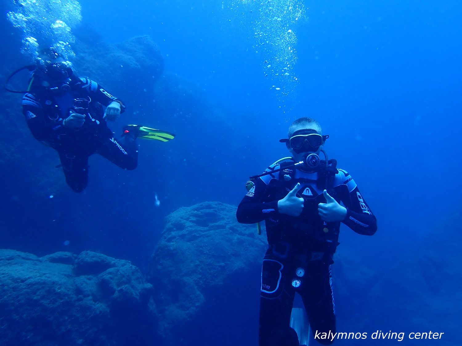 Two divers in the blue